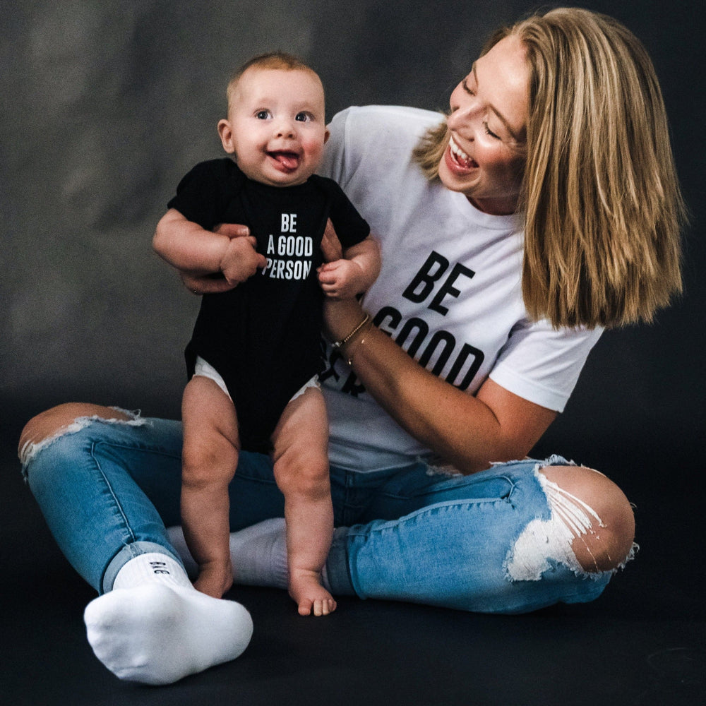 
                      
                        Signature Baby Onesie - Black
                      
                    